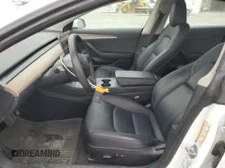 2023 Tesla Model 3 с VIN 5YJ3E1EA3PF557941, выставлен на аукционе Copart как лот 53047505 с пробегом 53 060 миль миль и Списание • Salvage title. История ставок и продаж доступна на DreamBid. Изображение 7.