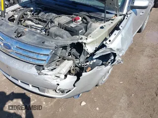 2008 Ford Taurus SEL with VIN 1FAHP27W48G103208, listed as a IAAI auction lot 41675026 with 154,608 mi miles. Bid and sale history available at carsss.com. Image 6.