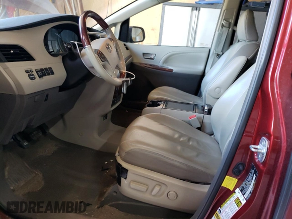 2012 Toyota Sienna XLE AAS with VIN 5TDYK3DC5CS187675, listed as a Copart auction lot 55211635 with 328,972 mi miles and Clean Title. Bid and sale history available at DreamBid. Image 7.