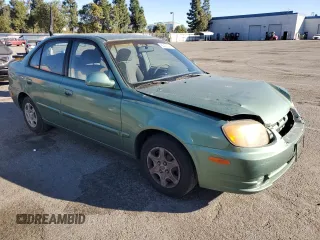 2003 Hyundai Accent GL with VIN KMHCG45C63U430403, listed as a Copart auction lot 86430724 with 74,200 mi miles and Salvage Title. Bid and sale history available at carsss.com. Image 4.