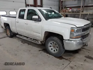 2016 Chevrolet Silverado 1500 LT with VIN 1GCVKREH6GZ231896, listed as a IAAI auction lot 41277803 with 97,196 mi miles and . Bid and sale history available at DreamBid. Image 1.