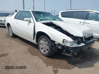 1995 Cadillac Eldorado Touring with VIN 1G6ET1290SU603205, listed as a IAAI auction lot 42402272 with 106,486 mi miles and . Bid and sale history available at DreamBid. Image 1.