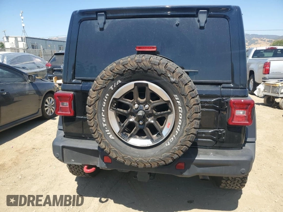 2020 Jeep Wrangler Unlimited Rubicon с VIN 1C4HJXFN3LW350249, выставлен на аукционе Copart как лот 60696895 с пробегом 56 577 миль миль и Списание • Salvage title. История ставок и продаж доступна на DreamBid. Изображение 6.