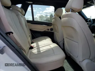 2018 BMW X5 xDrive35i with VIN 5UXKR0C53J0X93705, listed as a Copart auction lot 51715435 with 106,677 mi miles and Salvage Title. Bid and sale history available at carsss.com. Image 11.
