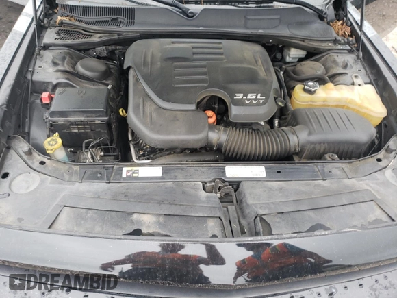 2013 Dodge Challenger SXT z VIN 2C3CDYAG6DH515778, wystawiony jako Copart lot #55976665 z przebiegiem 160 194 mil mil oraz Szkoda całkowita • Salvage title. Historia ofert i sprzedaży dostępna na DreamBid. Obrazek 11.