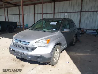 2007 Honda CR-V EX-L with VIN JHLRE387X7C069804, listed as a IAAI auction lot 41616256 with 136,271 mi miles. Bid and sale history available at carsss.com. Image 2.
