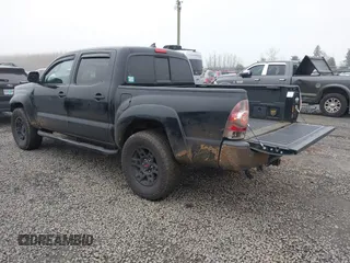2014 Toyota Tacoma with VIN 3TMLU4EN4EM159363, listed as a IAAI auction lot 41337909 with 123,362 mi miles. Bid and sale history available at carsss.com. Image 3.