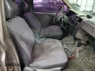 1987 Nissan Hardbody E z VIN JN6ND11S3HW057122, wystawiony jako Copart lot #73303004 z przebiegiem 233 309 mil mil oraz Szkody całkowita. Historia ofert i sprzedaży dostępna na DreamBid. Obrazek 11.