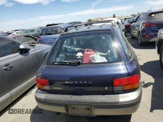 1996 Subaru Impreza Outback with VIN JF1GF4851TG811571, listed as a Copart auction lot 65650514 with 248,315 mi miles and Salvage title. Bid and sale history available at DreamBid. Image 6.