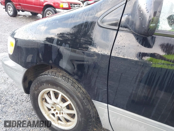 1998 Toyota Sienna LE with VIN 4T3ZF13C6WU016001, listed as a IAAI auction lot 42604162 with 214,491 mi miles and . Bid and sale history available at DreamBid. Image 12.