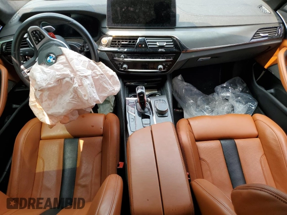 2021 BMW M5 z VIN WBS83CH04MCG92781, wystawiony jako Copart lot #52568153 z przebiegiem 29 528 mil mil oraz . Historia ofert i sprzedaży dostępna na DreamBid. Obrazek 8.