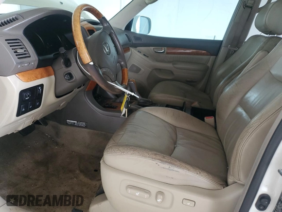 2006 Lexus GX 470 z VIN JTJBT20X060110741, wystawiony jako Copart lot #56944755 z przebiegiem 234 412 mil mil oraz Tytuł czysty. Historia ofert i sprzedaży dostępna na DreamBid. Obrazek 7.