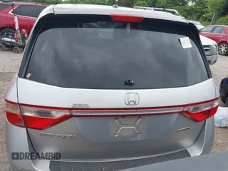 2011 Honda Odyssey Touring with VIN 5FNRL5H93BB071518, listed as a IAAI auction lot 42402421 with 227,647 mi miles and . Bid and sale history available at DreamBid. Image 16.