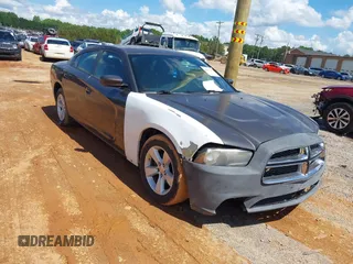 2014 Dodge Charger SE z VIN 2C3CDXBG5EH315467, wystawiony jako IAAI lot #42273742 z przebiegiem 153 493 mil mil oraz . Historia ofert i sprzedaży dostępna na DreamBid. Obrazek 1.