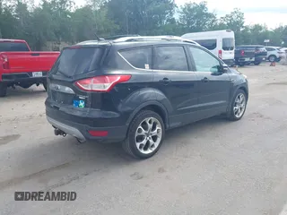 2015 Ford Escape Titanium with VIN 1FMCU9J92FUA96987, listed as a IAAI auction lot 42678423 with 188,956 mi miles and . Bid and sale history available at DreamBid. Image 4.