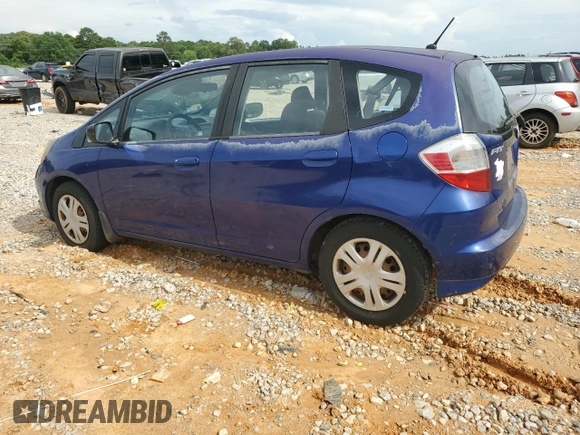 2009 Honda Fit with VIN JHMGE882X9S007865, listed as a Copart auction lot 61025875 with 159,919 mi miles and Clean title. Bid and sale history available at DreamBid. Image 2.