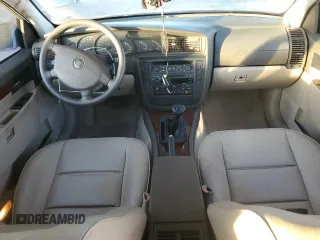 2000 Cadillac Catera z VIN W06VR54R5YR010954, wystawiony jako Copart lot #84863204 z przebiegiem 47 864 mil mil oraz Tytuł czysty. Historia ofert i sprzedaży dostępna na DreamBid. Obrazek 8.