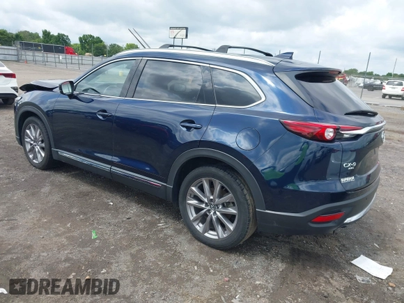 2020 Mazda CX-9 Grand Touring with VIN JM3TCBDY1L0402718, listed as a IAAI auction lot 42355511 with 87,205 mi miles and . Bid and sale history available at DreamBid. Image 3.