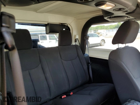 2014 Jeep Wrangler Sport with VIN 1C4AJWAG2EL113843, listed as a Copart auction lot 62771115 with 70,089 mi miles and Salvage title. Bid and sale history available at DreamBid. Image 11.