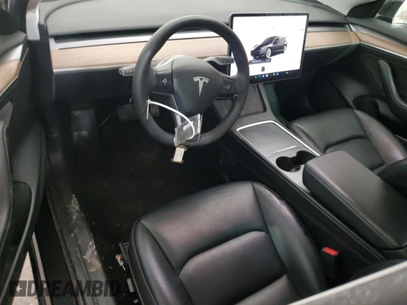 2023 Tesla Model 3 with VIN 5YJ3E1EA8PF451324, listed as a Copart auction lot 88318475 with 74,582 mi miles and Salvage Title. Bid and sale history available at DreamBid. Image 8.