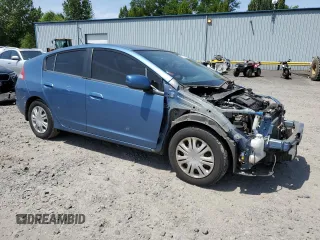 2010 Honda Insight LX z VIN JHMZE2H56AS008077, wystawiony jako Copart lot #60522045 z przebiegiem 105 936 mil mil oraz Szkoda całkowita • Salvage title. Historia ofert i sprzedaży dostępna na DreamBid. Obrazek 4.