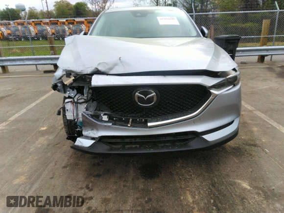 2019 Mazda CX-5 Grand Touring with VIN JM3KFADM2K1631928, listed as a IAAI auction lot 41961695 with 41,190 mi miles. Bid and sale history available at carsss.com. Image 6.