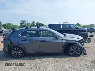 2021 Lexus UX 250h F Sport z VIN JTHE9JBHXM2045377, wystawiony jako IAAI lot #42580566 z przebiegiem 52 838 mil mil oraz . Historia ofert i sprzedaży dostępna na DreamBid. Obrazek 14.