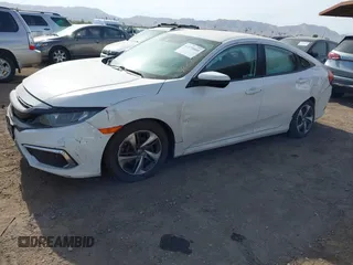 2019 Honda Civic Sedan LX with VIN 2HGFC2F62KH573149, listed as a IAAI auction lot 41575660 with 104,139 mi miles. Bid and sale history available at carsss.com. Image 6.