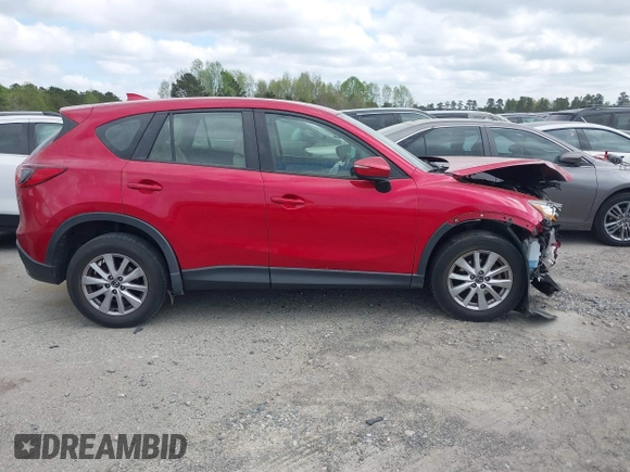 2016 Mazda CX-5 Sport with VIN JM3KE2BY9G0911535, listed as a IAAI auction lot 41906402 with 134,477 mi miles. Bid and sale history available at carsss.com. Image 14.