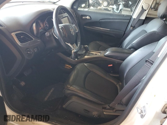 2015 Dodge Journey Crossroad with VIN 3C4PDCGG9FT631347, listed as a Copart auction lot 53991675 with 77,084 mi miles and Salvage Title. Bid and sale history available at DreamBid. Image 7.