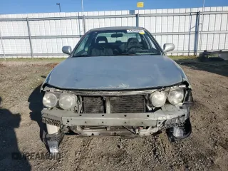 1998 Acura Integra LS with VIN JH4DB7659WS002591, listed as a Copart auction lot 84289584 with 316,458 mi miles and Salvage title. Bid and sale history available at DreamBid. Image 5.