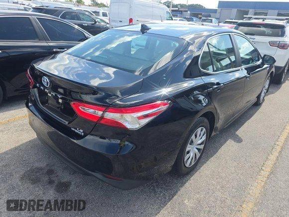 2019 Toyota Camry Hybrid LE z VIN 4T1B31HK0KU511923, wystawiony jako IAAI lot #42566419 z przebiegiem 67 166 mil mil oraz . Historia ofert i sprzedaży dostępna na DreamBid. Obrazek 23.