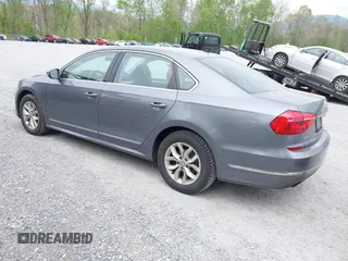 2016 Volkswagen Passat 1.8T S with VIN 1VWAT7A39GC032948, listed as a IAAI auction lot 42127599 with 177,407 mi miles. Bid and sale history available at carsss.com. Image 3.