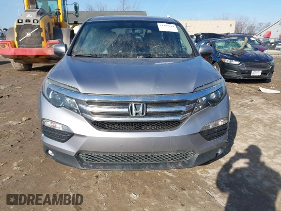 2017 Honda Pilot EX-L with VIN 5FNYF6H50HB059096, listed as a IAAI auction lot 41757214 with 165,651 mi miles and . Bid and sale history available at DreamBid. Image 12.