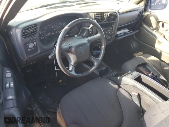 2003 GMC Sonoma SLS z VIN 1GTCS19X438152267, wystawiony jako Copart lot #73819614 z przebiegiem Nie podano mil oraz Szkoda całkowita • Salvage title. Historia ofert i sprzedaży dostępna na DreamBid. Obrazek 8.