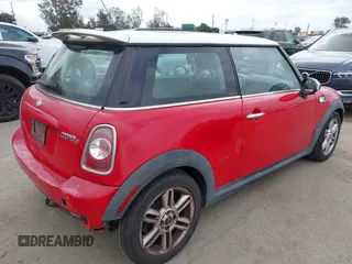2013 MINI Hardtop S with VIN WMWSV3C55DT388301, listed as a IAAI auction lot 42058792 with 94,138 mi miles and . Bid and sale history available at DreamBid. Image 4.