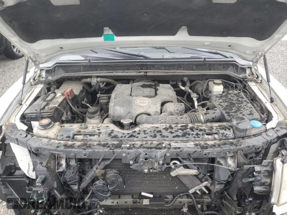 2010 Nissan Titan SE with VIN 1N6BA0ED7AN324632, listed as a Copart auction lot 57095185 with 156,391 mi miles and Salvage title. Bid and sale history available at DreamBid. Image 11.