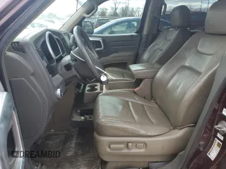 2007 Honda Ridgeline RTL z VIN 2HJYK16547H527465, wystawiony jako Copart lot #47943765 z przebiegiem 205 927 mil mil oraz Tytuł czysty. Historia ofert i sprzedaży dostępna na DreamBid. Obrazek 7.