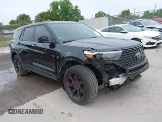 2021 Ford Explorer ST z VIN 1FM5K8GC0MGA12561, wystawiony jako IAAI lot #41891666 z przebiegiem 74 750 mil mil oraz . Historia ofert i sprzedaży dostępna na DreamBid. Obrazek 1.
