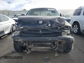 2004 Dodge Dakota SLT with VIN 1D7HG42N44S749267, listed as a Copart auction lot 89313825 with 215,047 mi miles and Salvage Title. Bid and sale history available at carsss.com. Image 5.