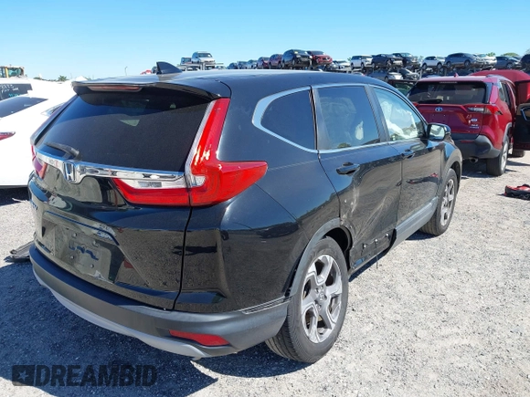 2017 Honda CR-V EX with VIN 7FARW1H52HE000353, listed as a IAAI auction lot 41824218 with 91,204 mi miles. Bid and sale history available at carsss.com. Image 4.