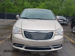 2014 Chrysler Town & Country Touring with VIN 2C4RC1BG7ER208937, listed as a IAAI auction lot 42213347 with 198,077 mi miles and . Bid and sale history available at DreamBid. Image 6.