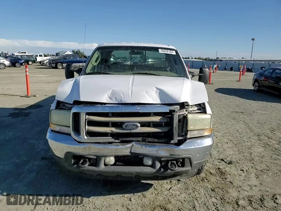 2003 Ford F-350 XL with VIN 1FTSW30F63EB07672, listed as a Copart auction lot 76659184 with 243,580 mi miles and Salvage Title. Bid and sale history available at DreamBid. Image 11.