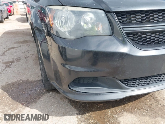 2016 Dodge Grand Caravan SE with VIN 2C4RDGBG8GR115833, listed as a IAAI auction lot 41715394 with 295,215 mi miles and . Bid and sale history available at DreamBid. Image 18.