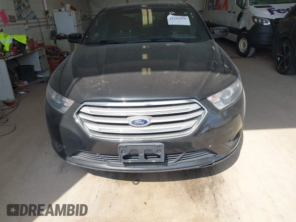 2015 Ford Taurus SEL with VIN 1FAHP2E84FG190092, listed as a IAAI auction lot 42215979 with 187,871 mi miles and . Bid and sale history available at DreamBid. Image 12.