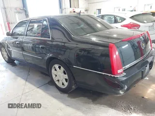 2006 Cadillac DTS 1SB z VIN 1G6KD57Y16U185783, wystawiony jako IAAI lot #41696044 z przebiegiem 198 193 mil mil oraz . Historia ofert i sprzedaży dostępna na DreamBid. Obrazek 3.