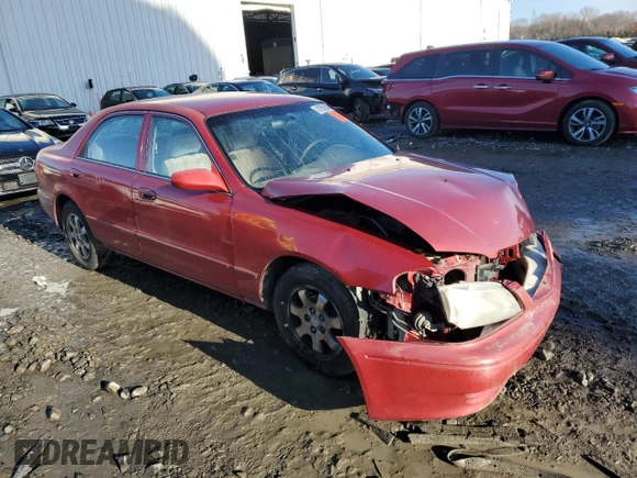 2000 Mazda 626 LX z VIN 1YVGF22CXY5172092, wystawiony jako Copart lot #81960694 z przebiegiem 214 185 mil mil oraz Szkoda całkowita • Salvage title. Historia ofert i sprzedaży dostępna na DreamBid. Obrazek 4.