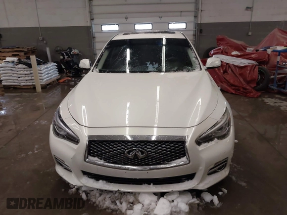 2015 Infiniti Q50 Premium z VIN JN1BV7AR0FM417283, wystawiony jako IAAI lot #41579549 z przebiegiem 112 407 mil mil oraz . Historia ofert i sprzedaży dostępna na DreamBid. Obrazek 13.