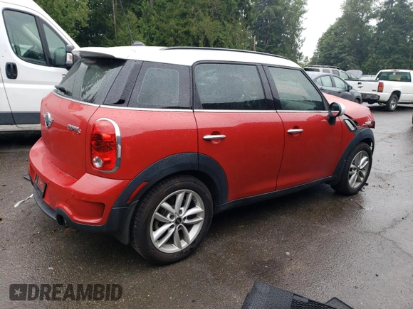2014 MINI Countryman S with VIN WMWZC3C52EWP25379, listed as a Copart auction lot 61438355 with 76,943 mi miles and Salvage title. Bid and sale history available at DreamBid. Image 3.