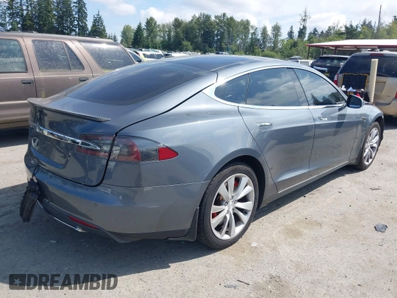 2014 Tesla Model S 60 with VIN 5YJSA1H18EFP38078, listed as a IAAI auction lot 42748619 with 159,285 mi miles and . Bid and sale history available at DreamBid. Image 4.